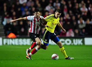 Southampton V Bristol City Prints: Adam Lallana vs. James Wilson: Battle for the Ball in Southampton vs