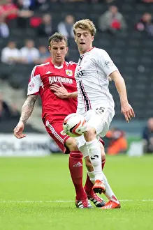 Aden Flint of Bristol City Closes In on Patrick Bamford of Milton Keynes Dons