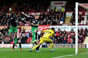Framed Print : Aden Flint Charges Towards Brentford Goal: Sky Bet Championship Clash Between Brentford and Bristol City Framed Print : Aden Flint Charges Towards Brentford Goal: Sky Bet Championship Clash Between Brentford and Bristol City