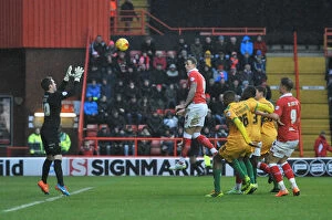 Images Dated 26th December 2014: Aden Flint Charges Towards Goal: Intense Moment from Bristol City vs Yeovil Town, Sky Bet League One