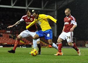 Images Dated 4th February 2014: Aden Flint Chases Down Nathan Delfouneso: Bristol City vs Coventry City Football Rivalry