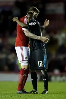 Bristol City V Stevenage Prints: Aden Flint Consoles Disappointed Francois Zoko After Bristol City's 4-1 Victory