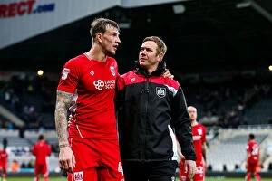 Images Dated 25th February 2017: Aden Flint and Dean Holden of Bristol City Discuss 2-2 Draw with Newcastle United at St. James Park
