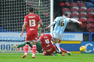 Yorkshire Prints: Aden Flint Tackles Emyr Huws in Intense Championship Clash: Huddersfield Town vs