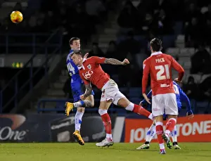 Gillingham V Bristol City - JPT Prints: Aden Flint vs Ben Dickenson: Intense Header Battle in Gillingham v Bristol City (JPT Area Final)