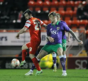 Leyton Orient V Bristol City Prints: Aden Flint vs. Chris Dagnall: Intense Battle for the Ball in Leyton Orient vs