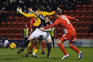 Aden Flint vs. Gary Sawyer: Intense Defensive Clash in Leyton Orient vs. Bristol City Football Match, 2014
