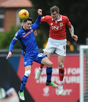 Bristol City V Rochdale Prints: Aden Flint vs. Ian Henderson: Intense Header Battle at Ashton Gate