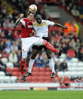 Bristol City V Colchester United Prints: Aden Flint vs Jabo Ibehre: Battle for Supremacy in Bristol City vs Colchester United (Sky Bet League One)