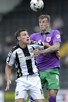 Framed Print : Aden Flint vs Jake Cassidy: Intense Header Battle in Notts County vs Bristol City Football Match, August 2014