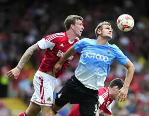 Bristol City V Bradford City Prints: Aden Flint vs. James Hanson: Intense Header Battle at Ashton Gate - Bristol City vs