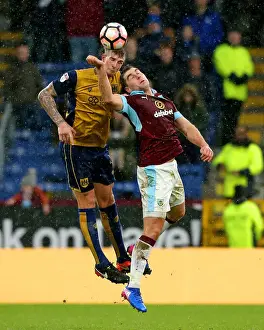 Burnley Prints: Aden Flint vs Michael Keane: Intense Battle at Turf Moor - Burnley vs Bristol City
