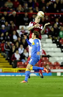 Bristol City V Shrewsbury Town Prints: Aden Flint Wins a Header for Bristol City against Shrewsbury Town