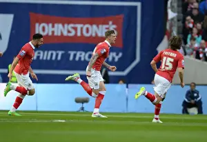 Season 14/15 JPT Final Prints: Aden Flint's Emotional Victory: Bristol City's Johnstone's Paint Trophy Triumph at Wembley Stadium