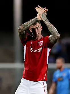 Glanford Park Prints: Aden Flint's Triumphant Applause: Bristol City Celebrates EFL Cup Victory over Scunthorpe United