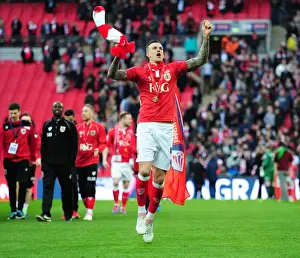 March Prints: Aden Flint's Triumphant Moment: Bristol City's Johnstone's Paint Trophy Victory at Wembley