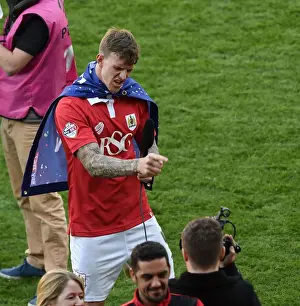 Aden Flint's Triumphant Moment: Champions League One Victory with Bristol City