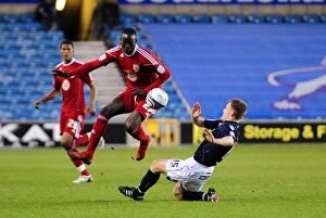 Images Dated 12th April 2011: Adomah Evasive: Millwall vs. Bristol City, Championship Showdown (12-04-2011)