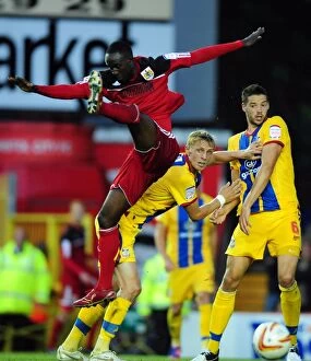 Images Dated 21st August 2012: Adomah Fights for Supremacy: Bristol City vs Crystal Palace, Championship Clash at Ashton Gate, 2012