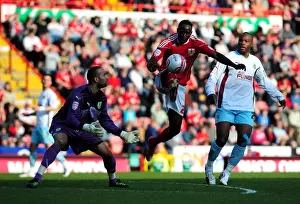 Bristol City V Burnley Prints: Adomah Outmaneuvers Grant: A Pivotal Moment in the 2011 Championship Clash Between Bristol City and Burnley