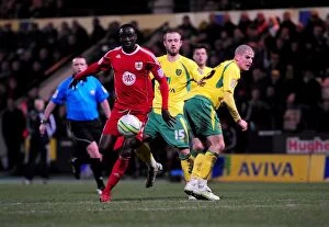 Images Dated 14th March 2011: Adomah Outmaneuvers Tierney: Norwich City vs. Bristol City Championship Clash (14-03-2011)