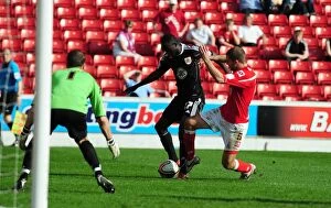 Images Dated 9th April 2011: Adomah Penalty Foul: Barnsley vs. Bristol City (Championship, 09/04/2011)