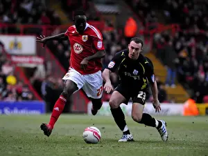 Bristol City V Cardiff City Prints: Adomah vs Blake: Intense Battle for Control in the 2011 Championship Clash between Bristol City and Cardiff City