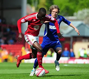Bristol City V Ipswich Town Prints: Adomah vs Bullard: Intense Battle for Ball Possession in Bristol City vs Ipswich Town Championship Clash