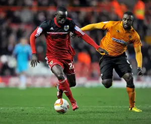 Bristol City V Wolves Prints: Adomah vs Ebanks-Blake: Intense Battle for Ball Possession during Bristol City vs Wolves Championship Match