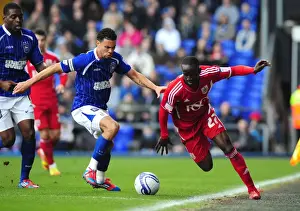 Ipswich Town V Bristol City Prints: Adomah vs Edwards: Intense Battle for Ball Possession during Ipswich Town vs Bristol City Football Match