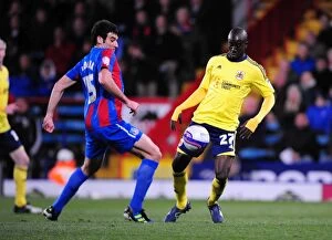 Images Dated 18th October 2011: Adomah vs Jedinak: Intense Battle in Championship Match between Crystal Palace