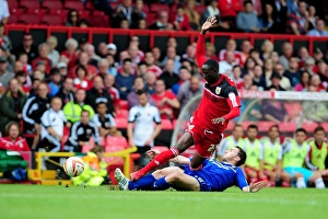 Framed Print : Adomah vs Mutch: Intense Battle at Ashton Gate, Bristol City vs Cardiff City, Championship Football, 2012