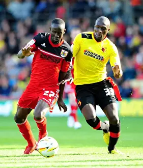 Watford V Bristol City Prints: Adomah vs. Nosworthy: Battle for Supremacy in the Championship Clash between Watford and Bristol City