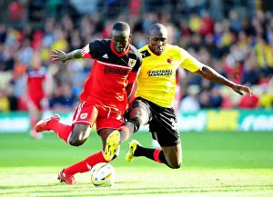 Watford V Bristol City Prints: Adomah vs. Nosworthy: Championship Showdown - Intense Battle for Ball Possession