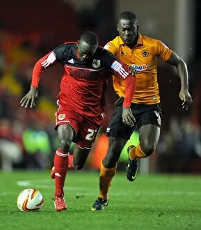 Images Dated 1st December 2012: Adomah vs. Nouble: Battle for Supremacy in Bristol City vs. Wolves Championship Clash