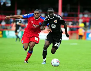 Adomah vs. Panther: Intense Battle for Ball Possession (Aldershot vs. Bristol City)