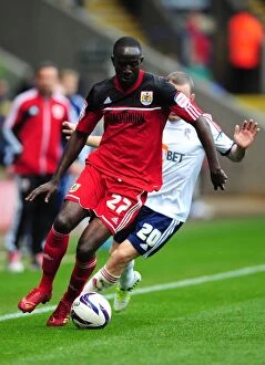 Images Dated 20th October 2012: Adomah vs Spearing: Intense Championship Showdown - Bristol City vs Bolton Wanderers