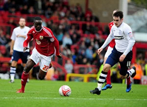 Images Dated 6th November 2010: Adomah vs. Treacy: Battle for Supremacy in the Championship Clash between Bristol City
