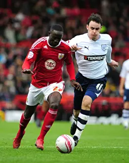 Adomah vs. Treacy: Intense Battle for Control in Bristol City vs. Preston North End Championship Clash, 2010