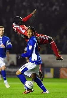 Images Dated 18th February 2011: Adomah vs. Van Aanholt: Battle for Supremacy in Leicester City vs