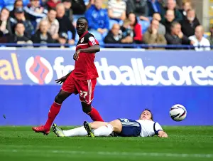 Bolton Wanderers V Bristol City Prints: Adomah vs Warnock: Intense Battle in the 2012 Championship Clash between Bolton Wanderers and Bristol City
