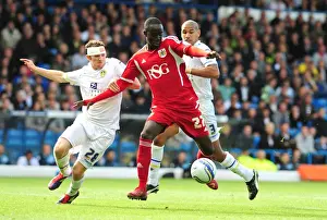 Leeds United V Bristol City Prints: Adomah vs. White: A Football Rivalry in the 2011 League Cup Clash between Leeds United and Bristol City