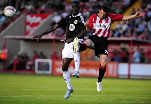 Exeter City V Bristol City Prints: Adomah's Determined Struggle: Battling for the Ball in the Exeter City vs
