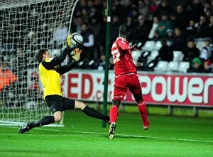 Images Dated 10th November 2010: Adomah's Dramatic Hit on the Bar: Swansea City vs. Bristol City (10/11/2010, Championship)