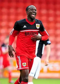 Pre Season Prints: Adomah's Goal Celebration: Bristol City's Pre-Season Triumph Over Dunfermline