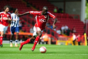 Season 11-12 Prints: Adomah's Thrilling Performance: Bristol City vs. West Brom, Championship 2011