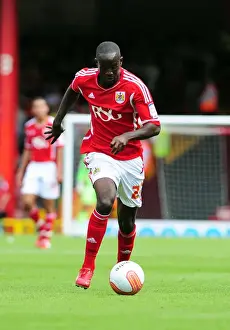 Bristol City V Ipswich Town Prints: Adomah's Unyielding Spirit: Championship Showdown between Bristol City and Ipswich Town at Ashton Gate