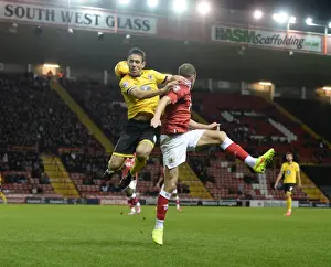 Aerial Battle: Bennett Overpowers Wilbraham in Johnstone's Paint Trophy Clash