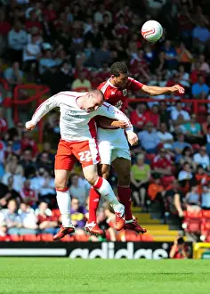 Bristol City V Nottingham Forest Prints: Aerial Battle: Nyatenge vs. Boyd - Championship Showdown at Ashton Gate (Bristol City vs)