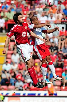 Bristol City V Nottingham Forest Prints: Aerial Battle: Skuse vs. Earnshaw - Championship Clash at Ashton Gate (Bristol City vs)